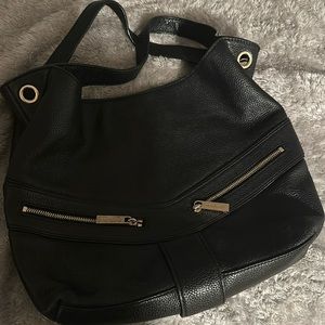 Michael Kohrs black leather bag , medium size great condition